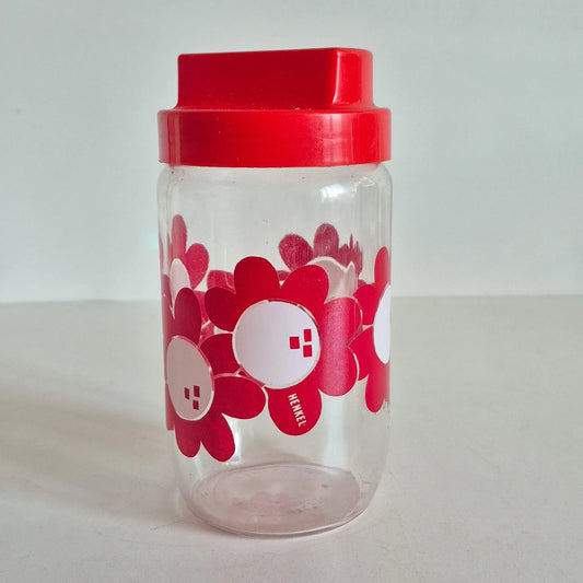 Bocal Henkel fleur rouge en verre vintage