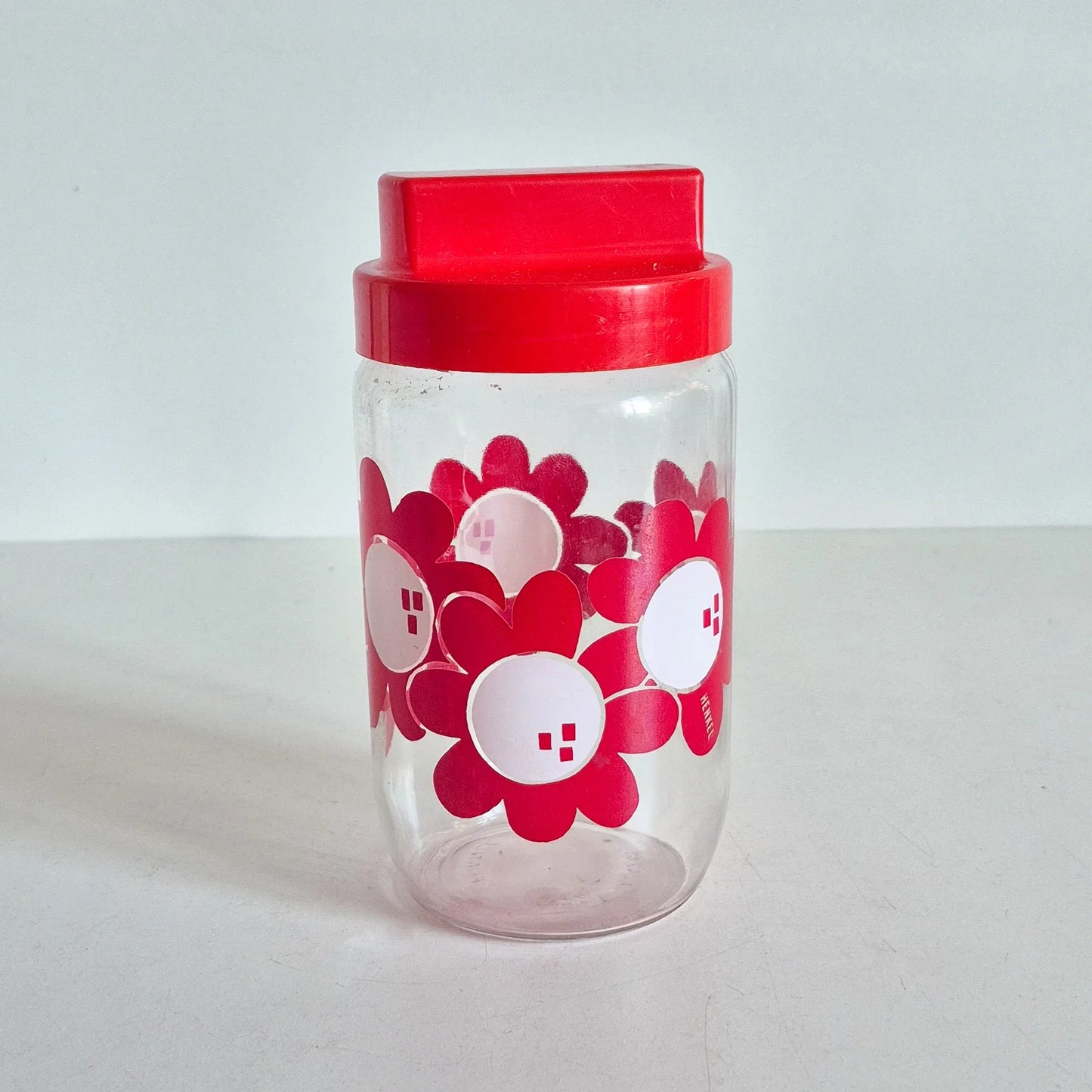 Bocal Henkel fleurs rouge vintage verre