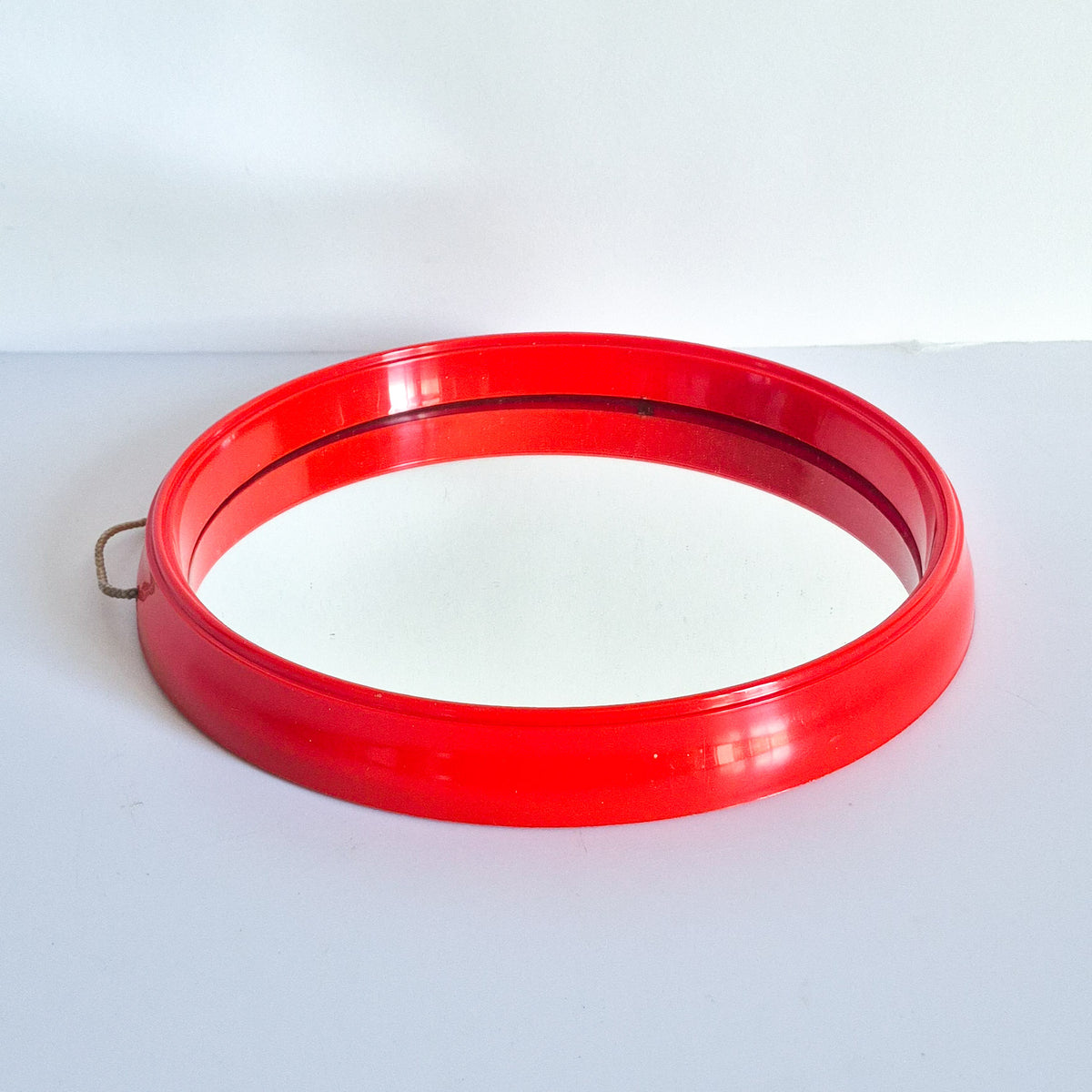 Miroir rond plastique orange vintage