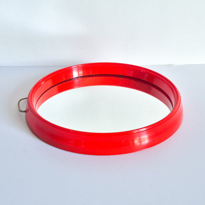 Miroir rond plastique orange vintage