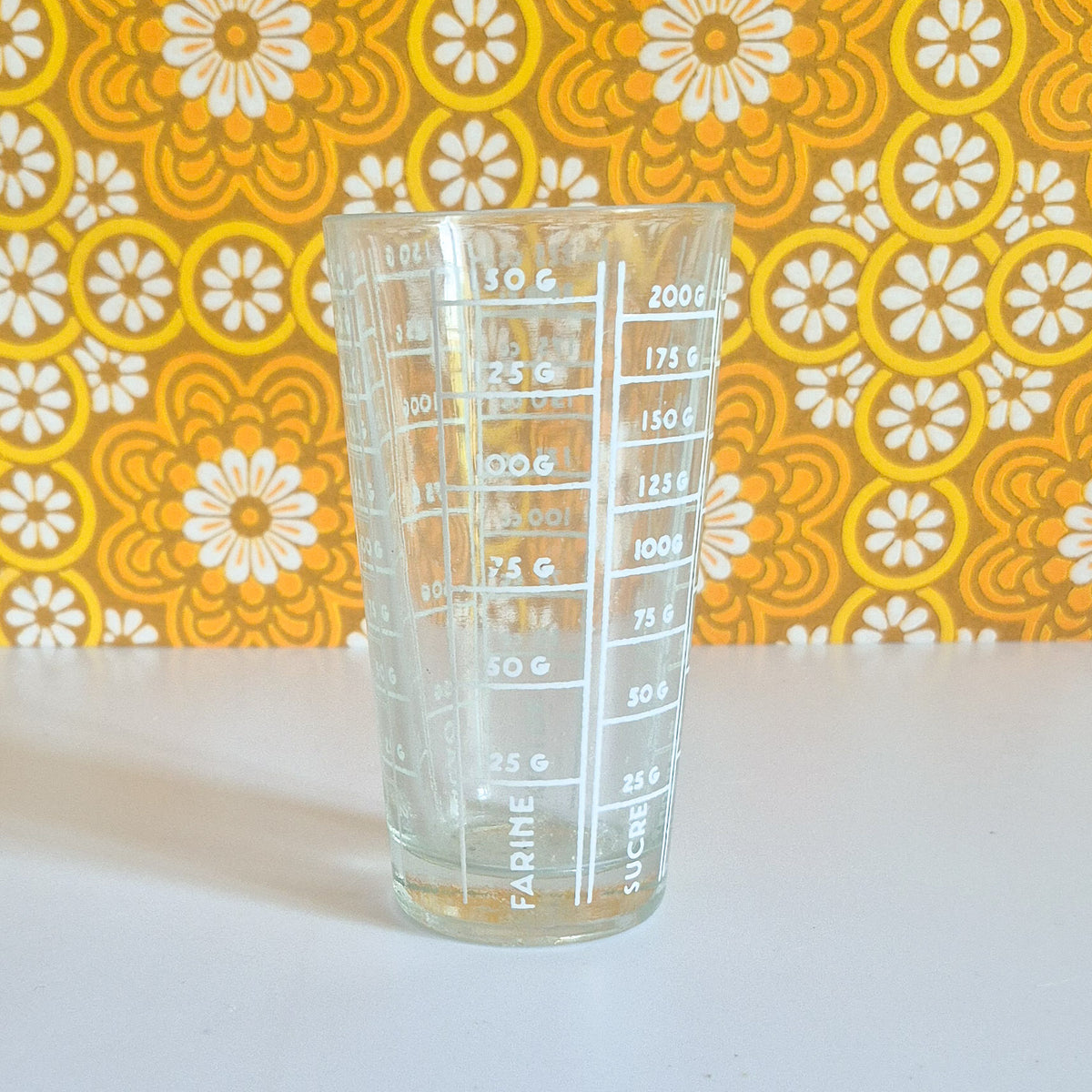 Verre doseur vintage en verre epais