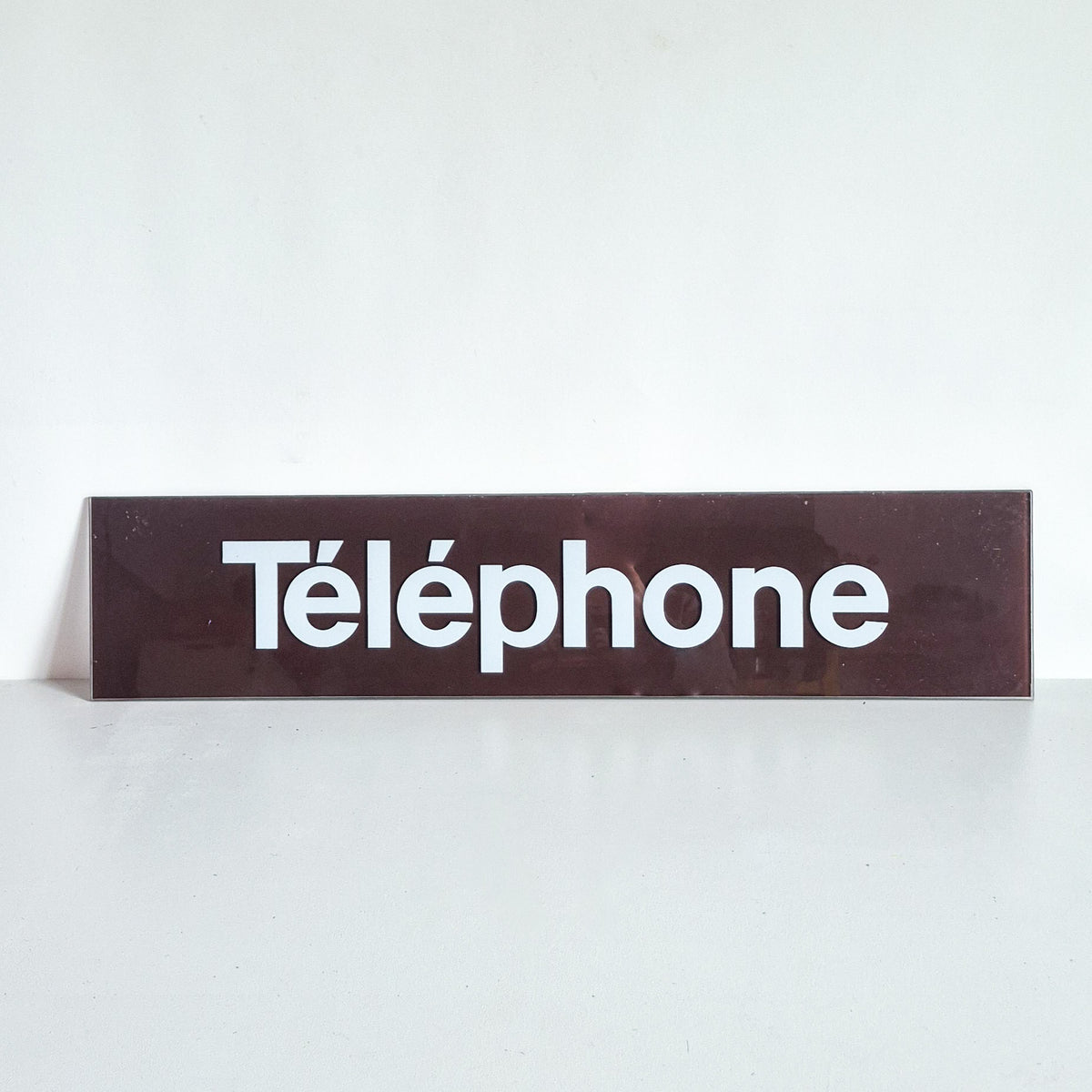 Plaque Téléphone en verre vintage